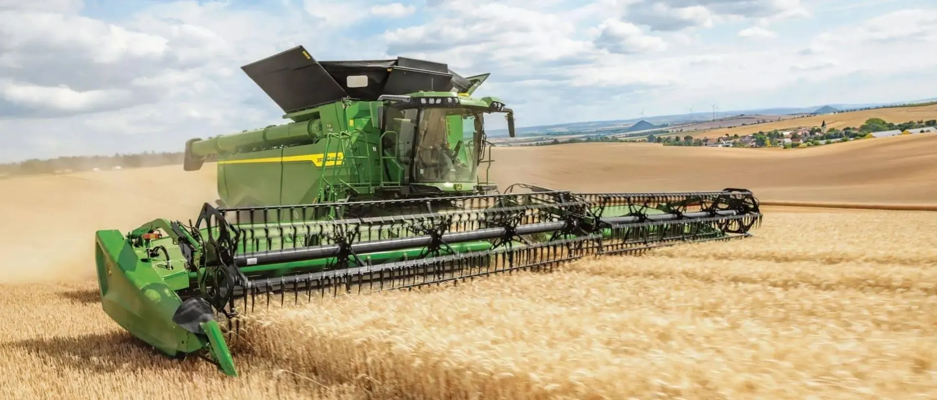 Combine harvester cutting wheat